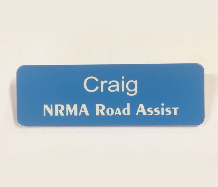 Light Blue Name Badge with White Text + Pin attached Laserable Plastic 70 x 23mm